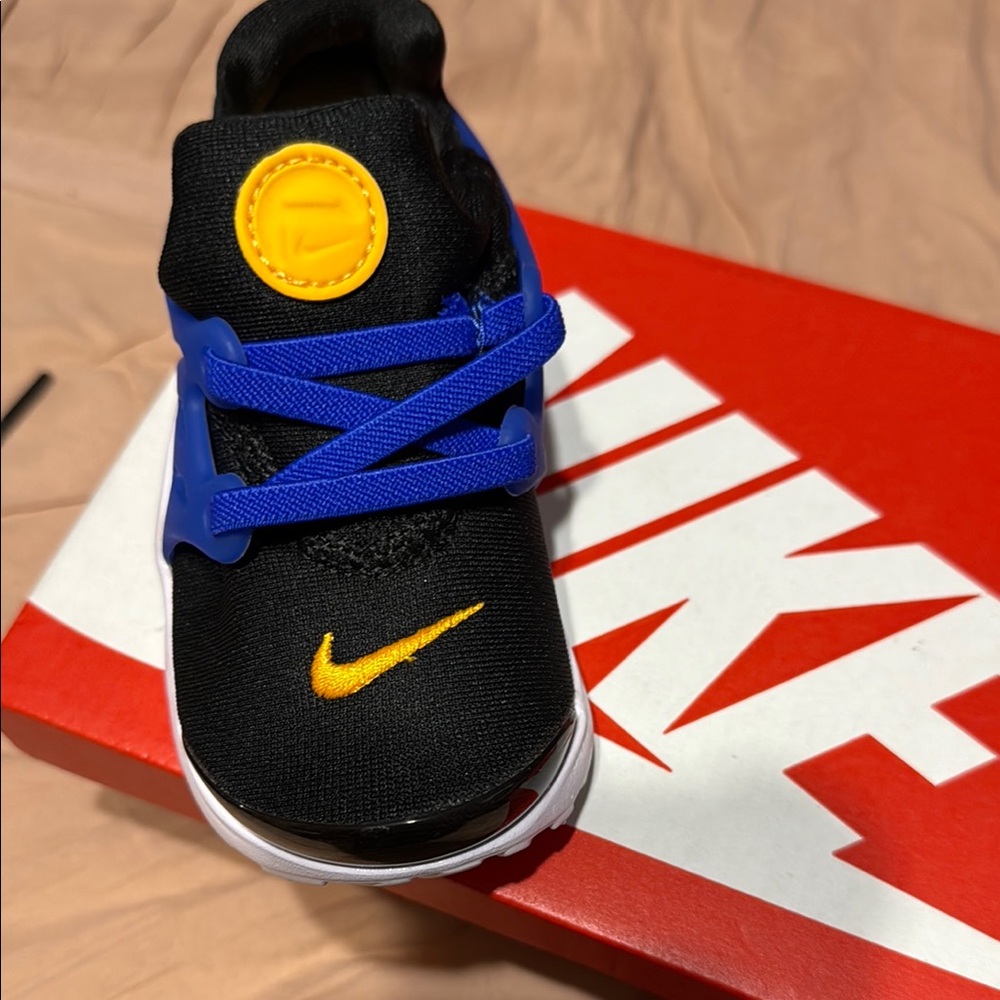 Nike Presto Kids Black Sneakers with Blue and Yellow Accents